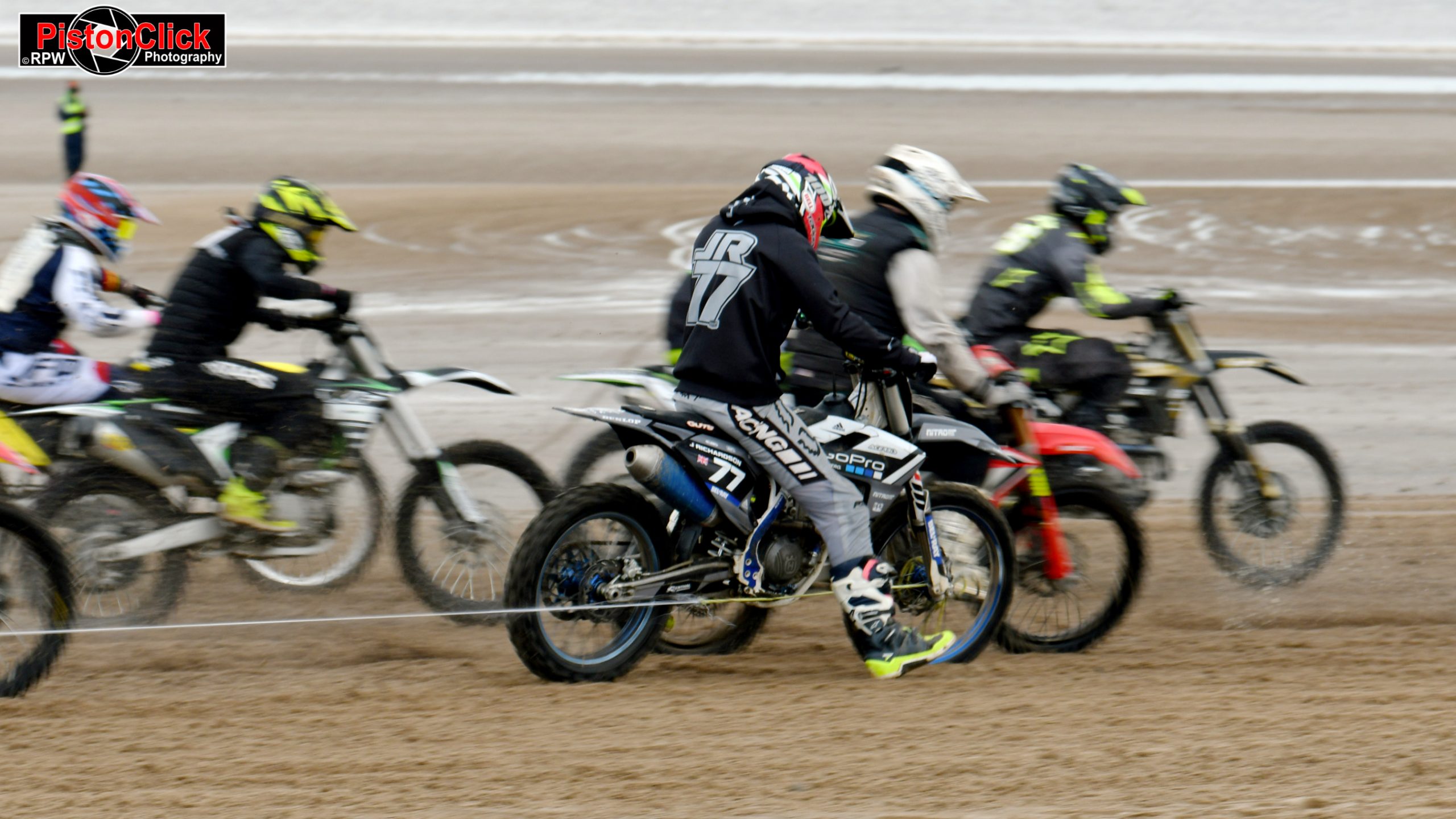 Riders racing on the sand at the Beach Motorcycle Racing Mablethorpe