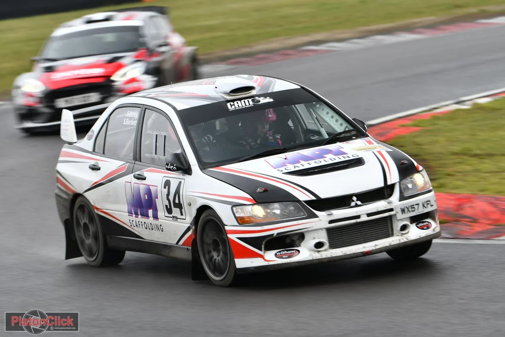 Sam Gendy/ Samantha Bartlett in a 1099 Mitsubishi Evo 9 Rally