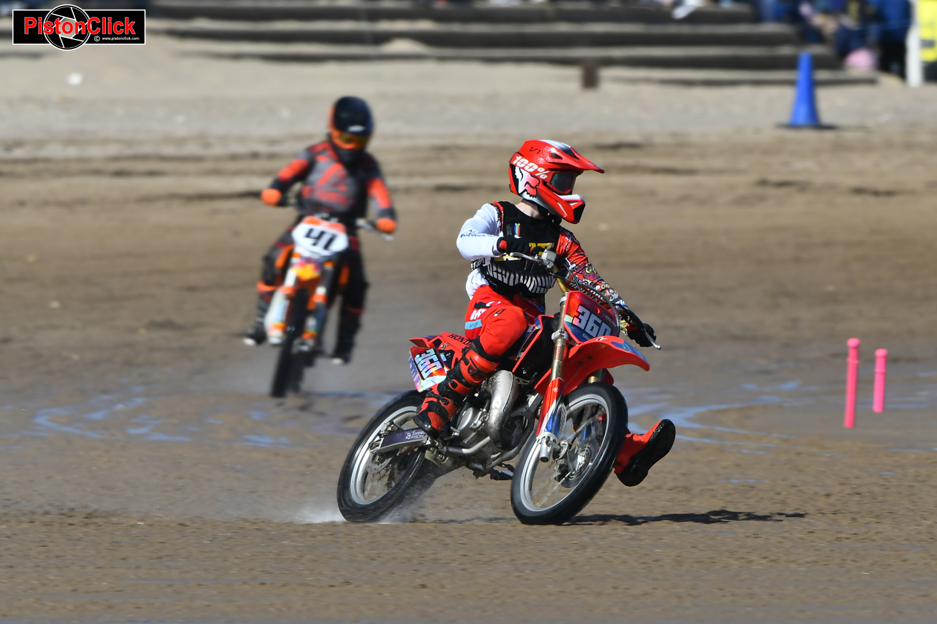 Young motocross riders sand racing