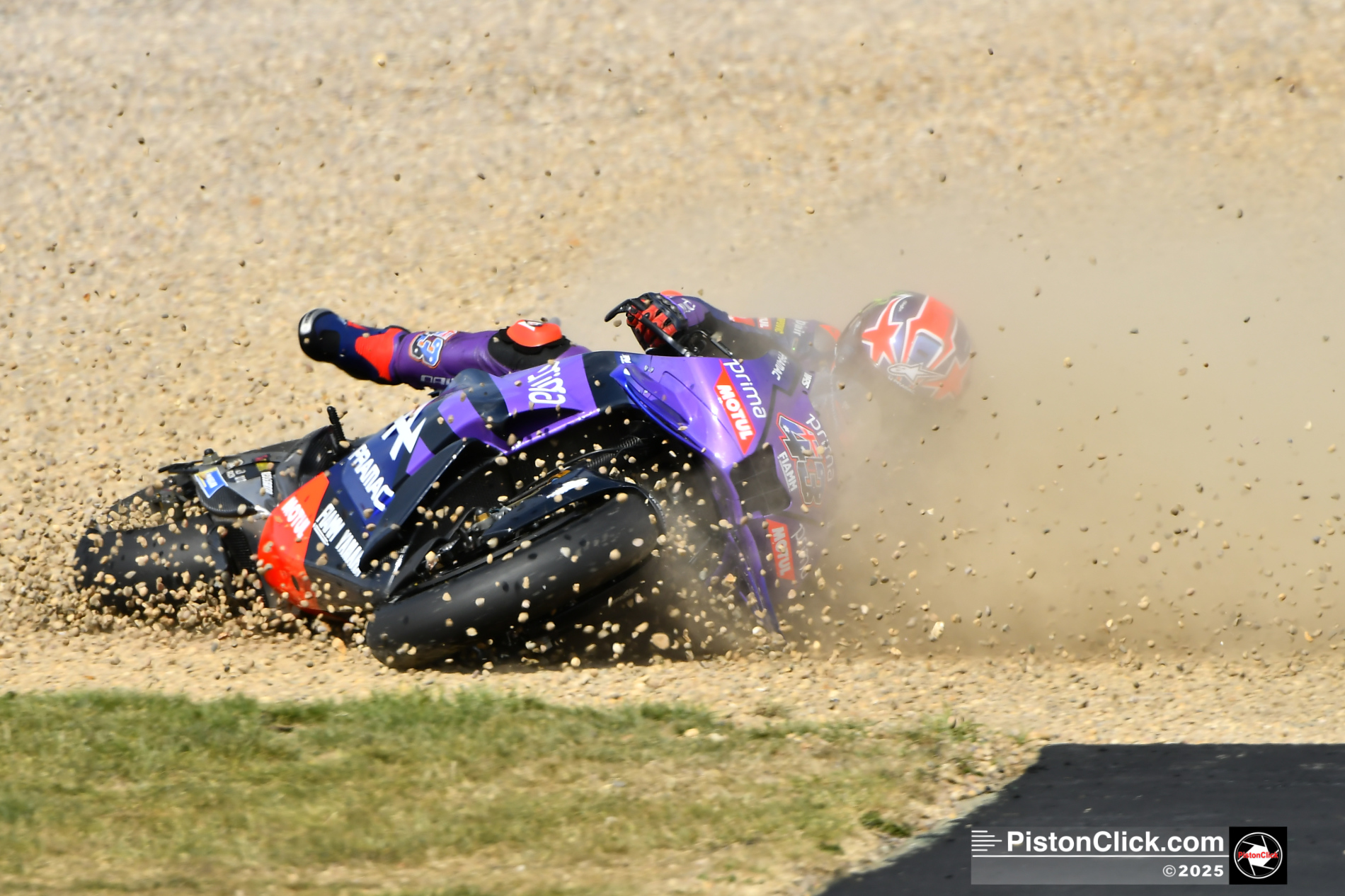 Jack Miller crashing in practice at he British MotoGP 2025
