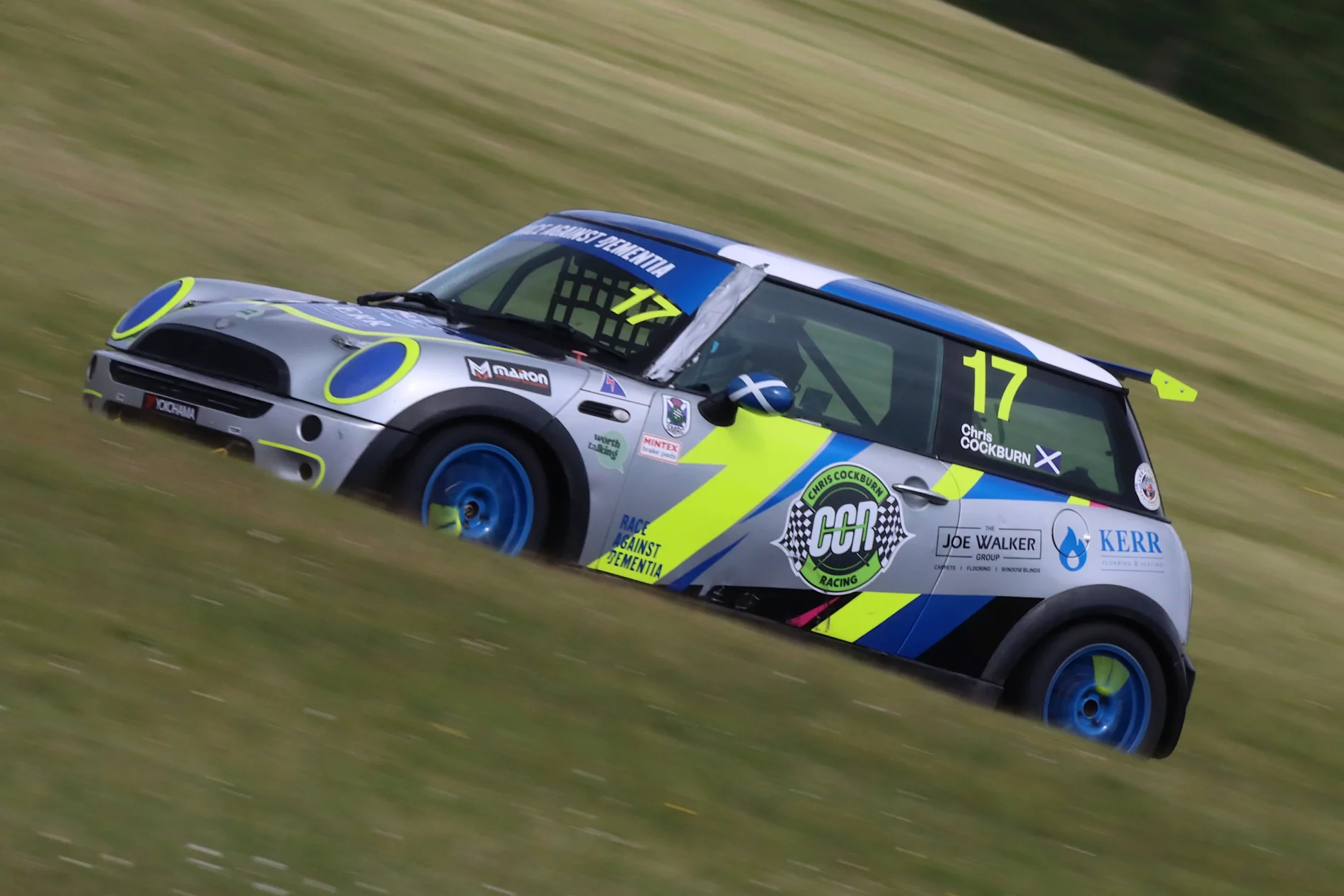 Minis racing at Cadwell Park 