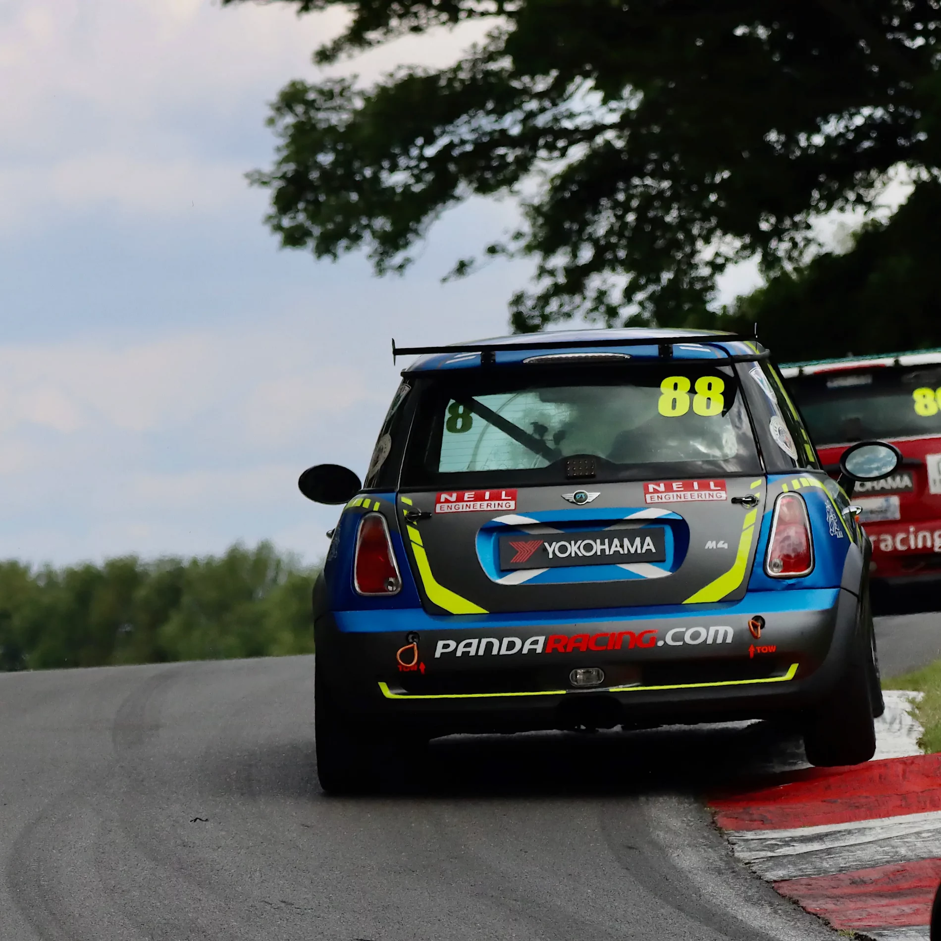 Minis racing at Cadwell Park 