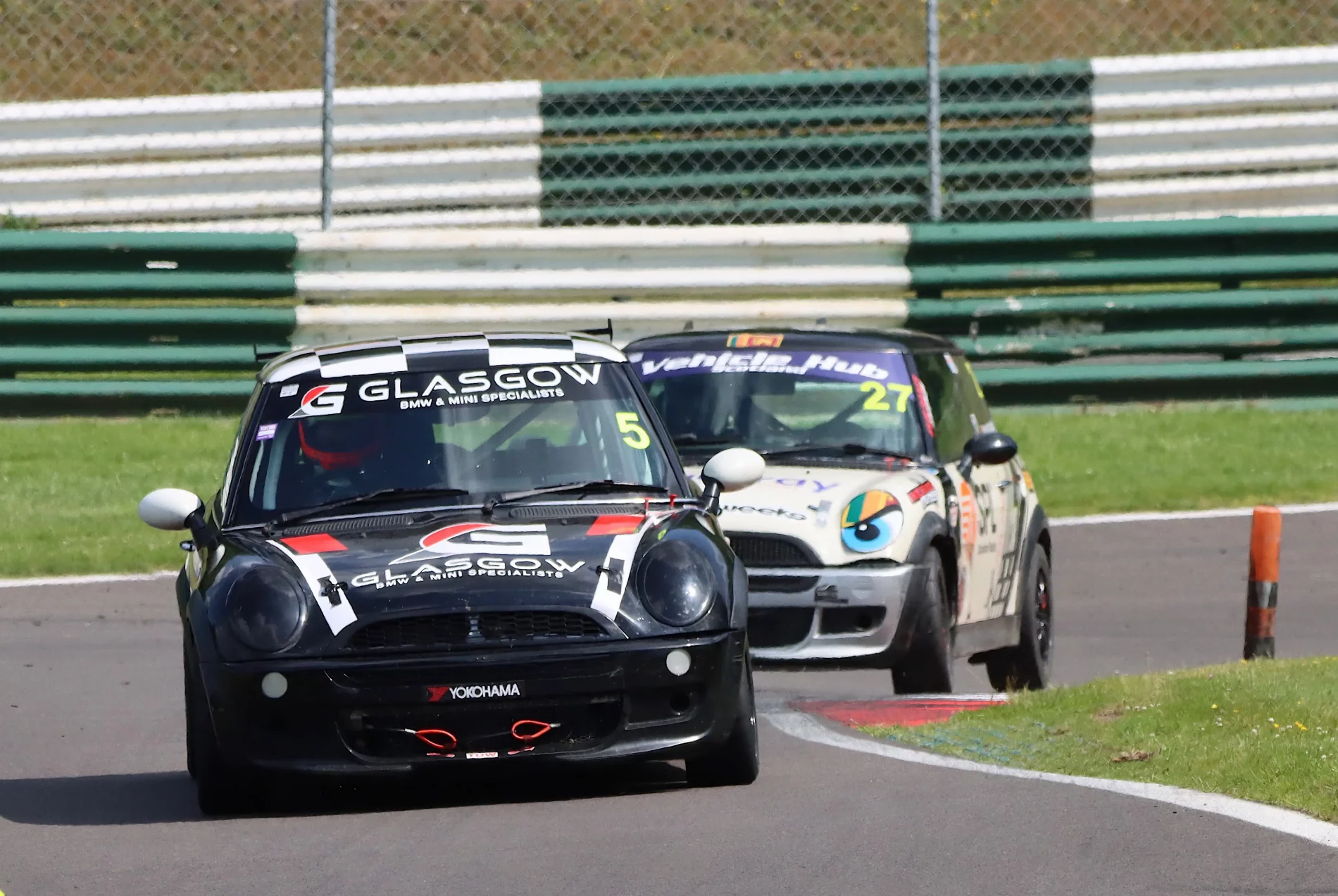 Minis racing at Cadwell Park 