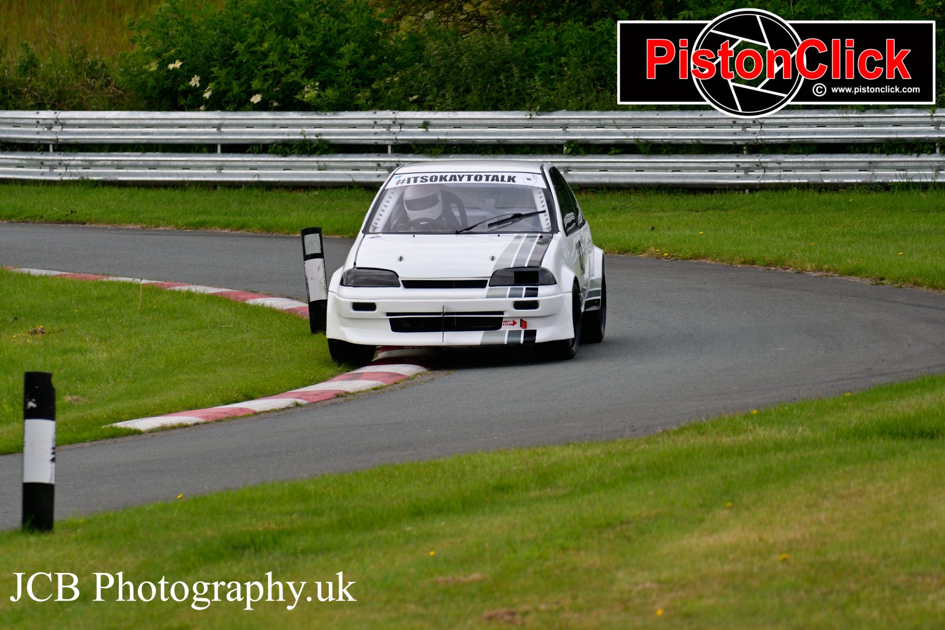 Mark Teale driving a Suzuki Swift