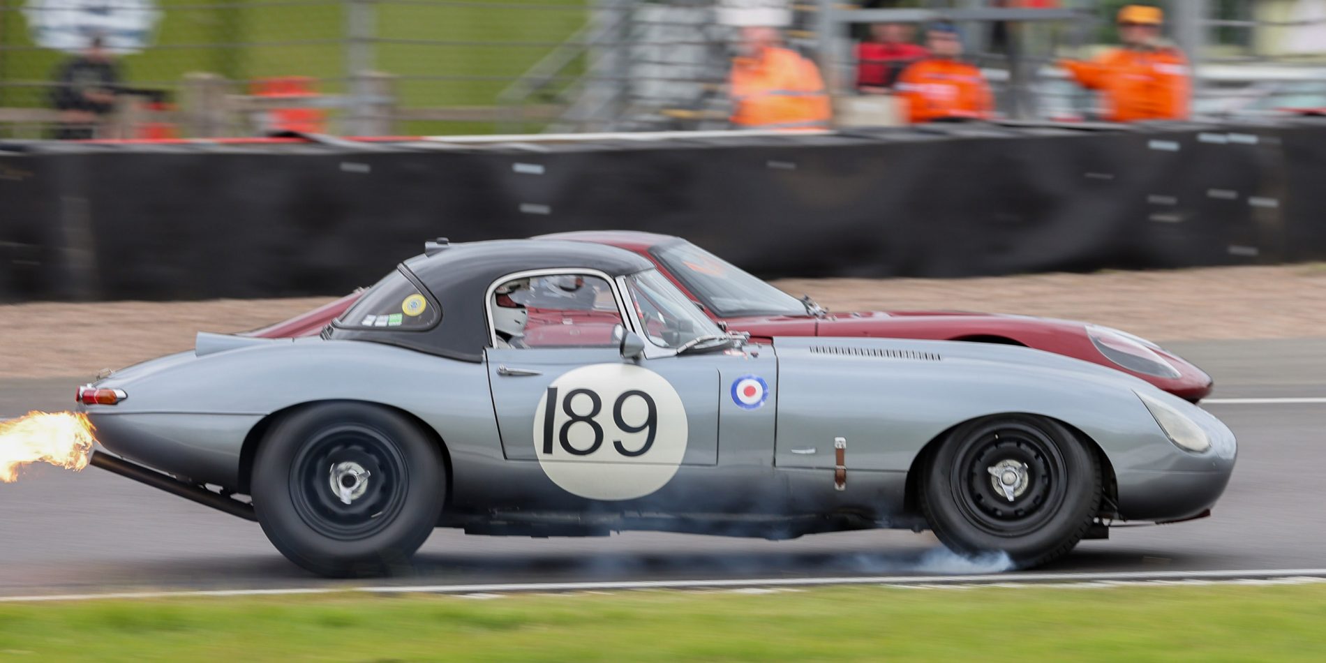 The fire spitting Jag of Dave Coyne/Eddie Farrell Equipe Classic Racing Donington Park