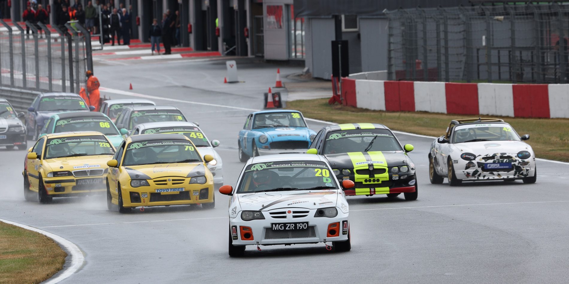 Rhys Higginbotham leads the MG Cup pack into Redgate.