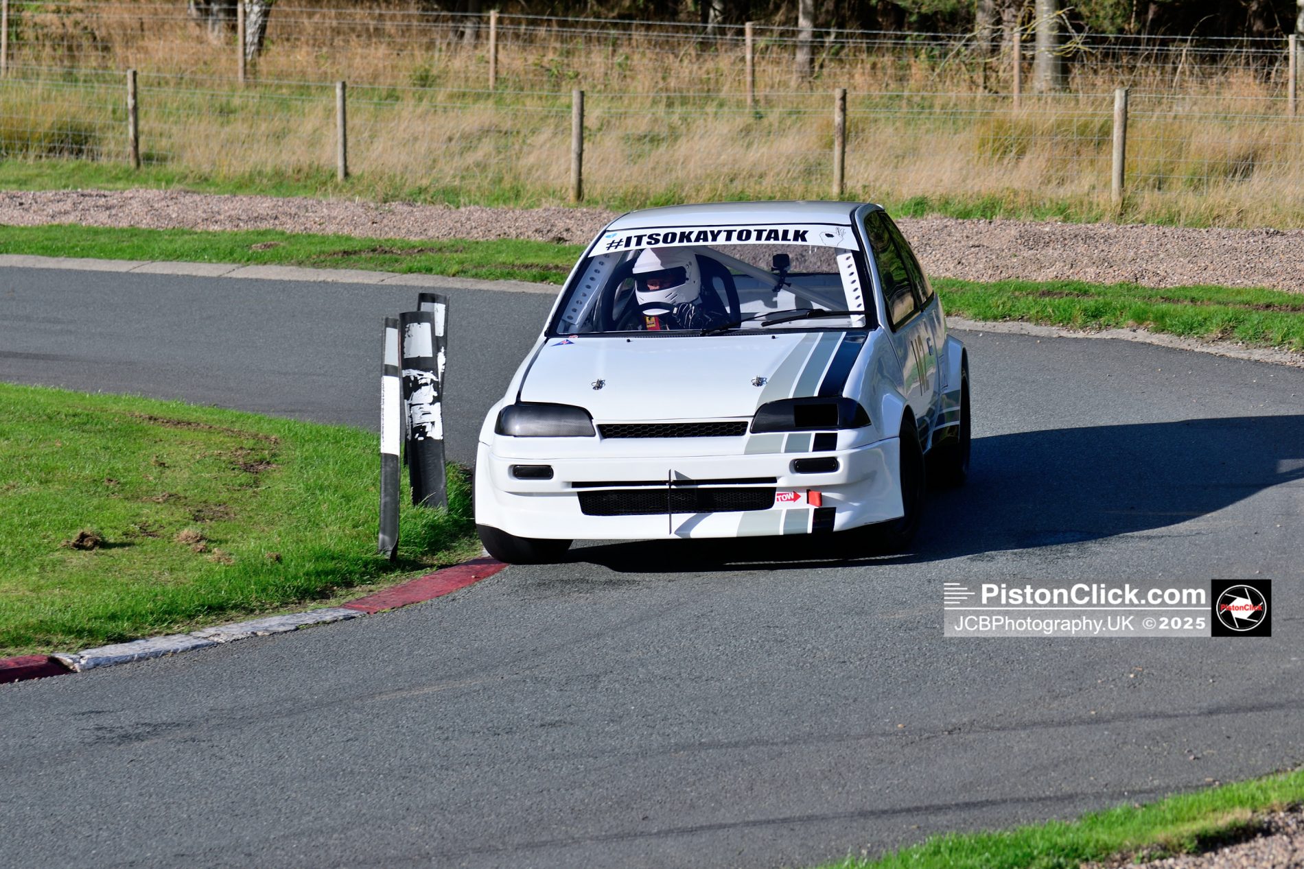 Mark Teale driving his highly modified Suzuki Swift