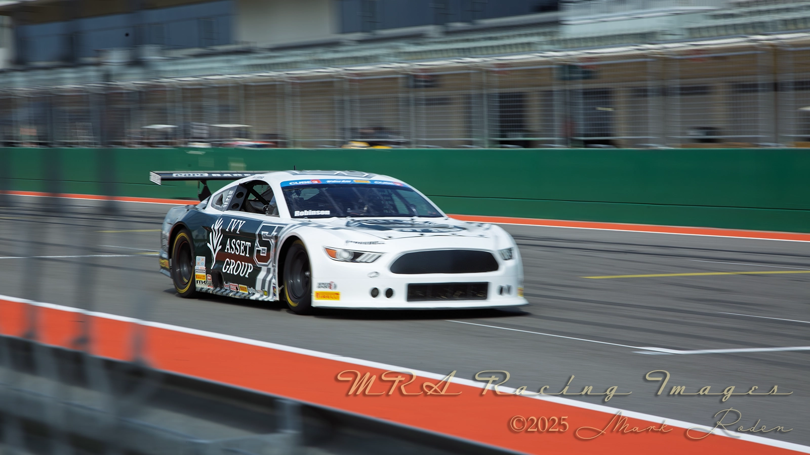 TA2 races cars at COTA