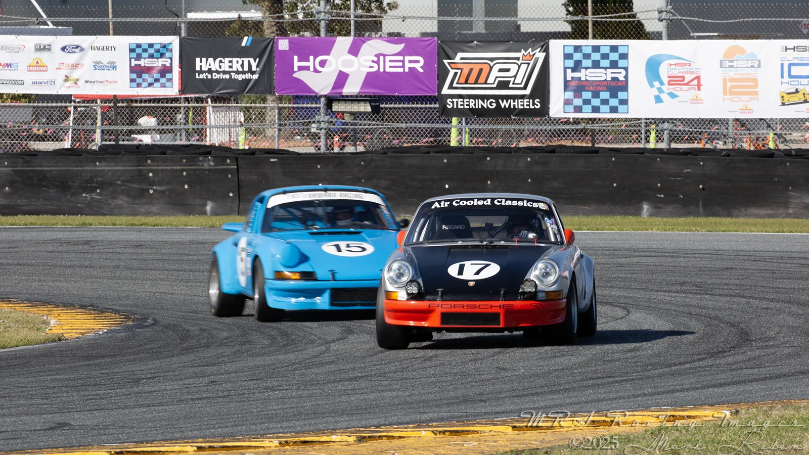 Porsches racing at the Daytona International Speedway Road Course