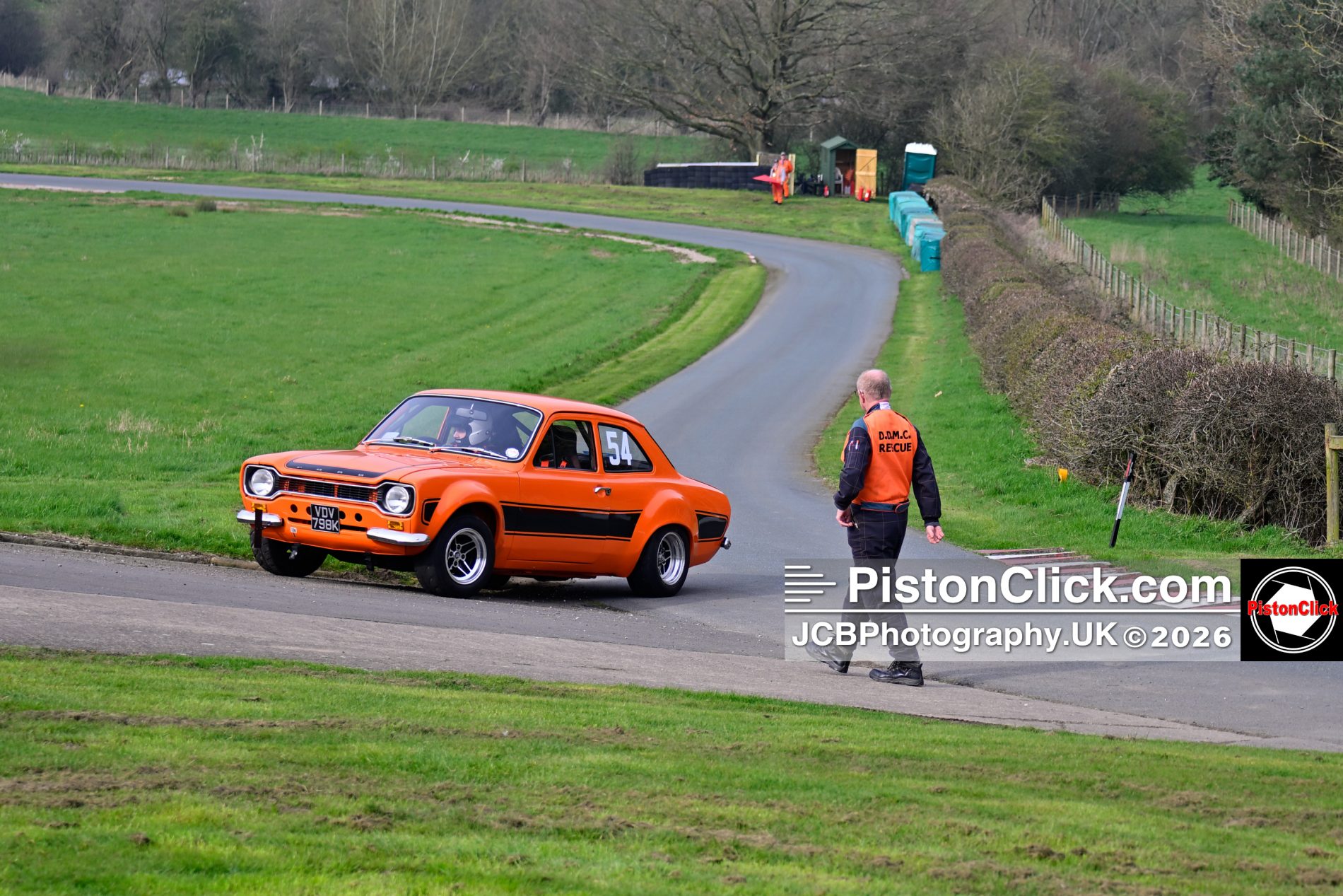 Harewood Hillclimb shortcut between the Farmhouse and Clubhouse to rejoin the cars waiting to start their run.
