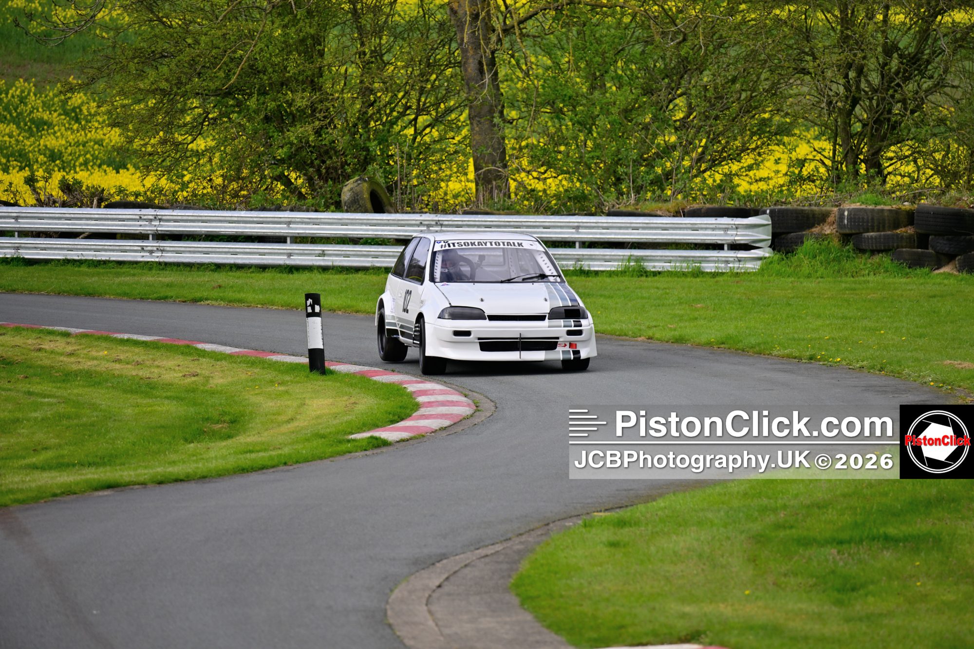 Mark Teale driving his Suzuki Swift GTi Harewood