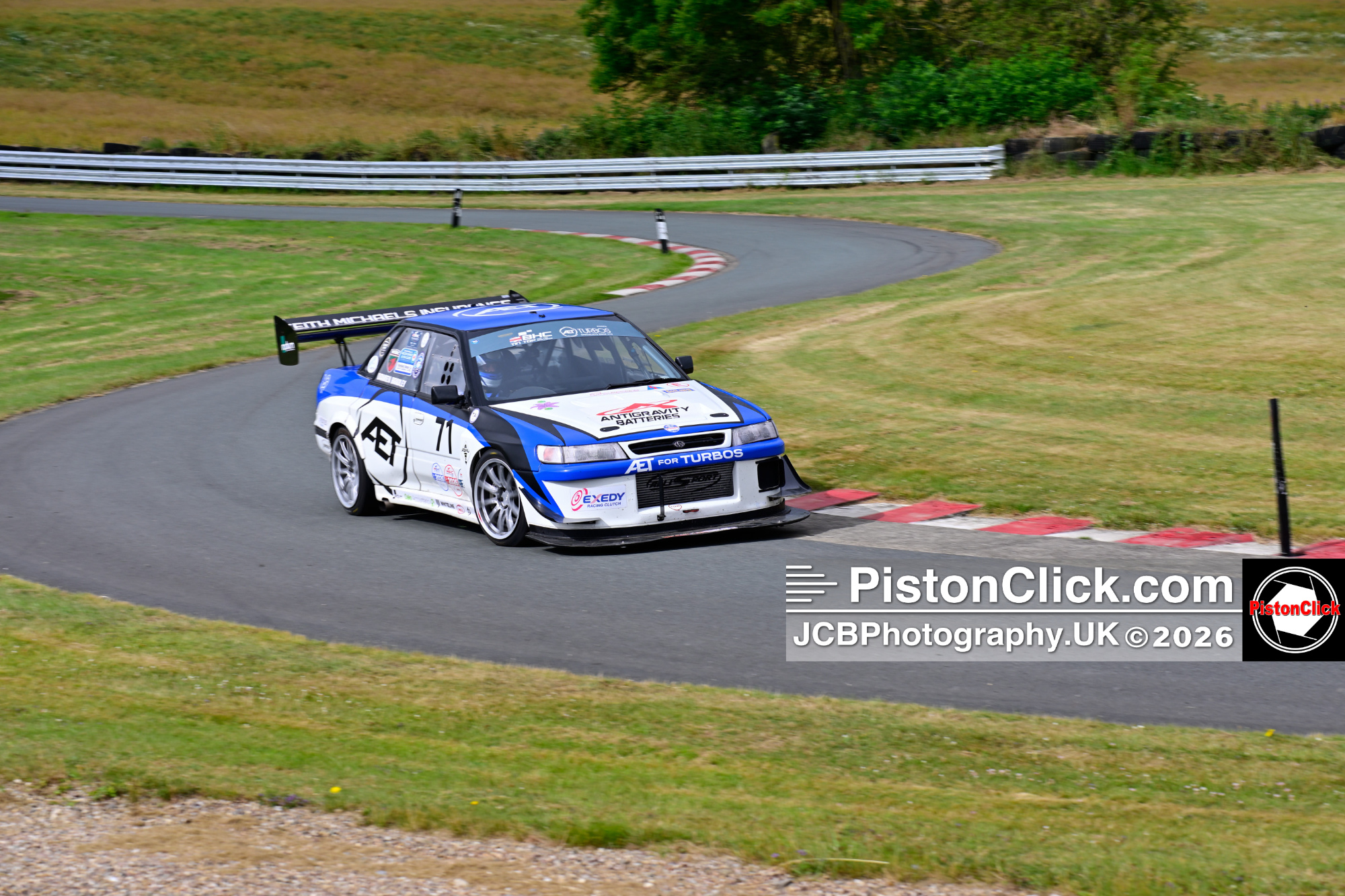 Damien Bradley driving his Subaru Legacy