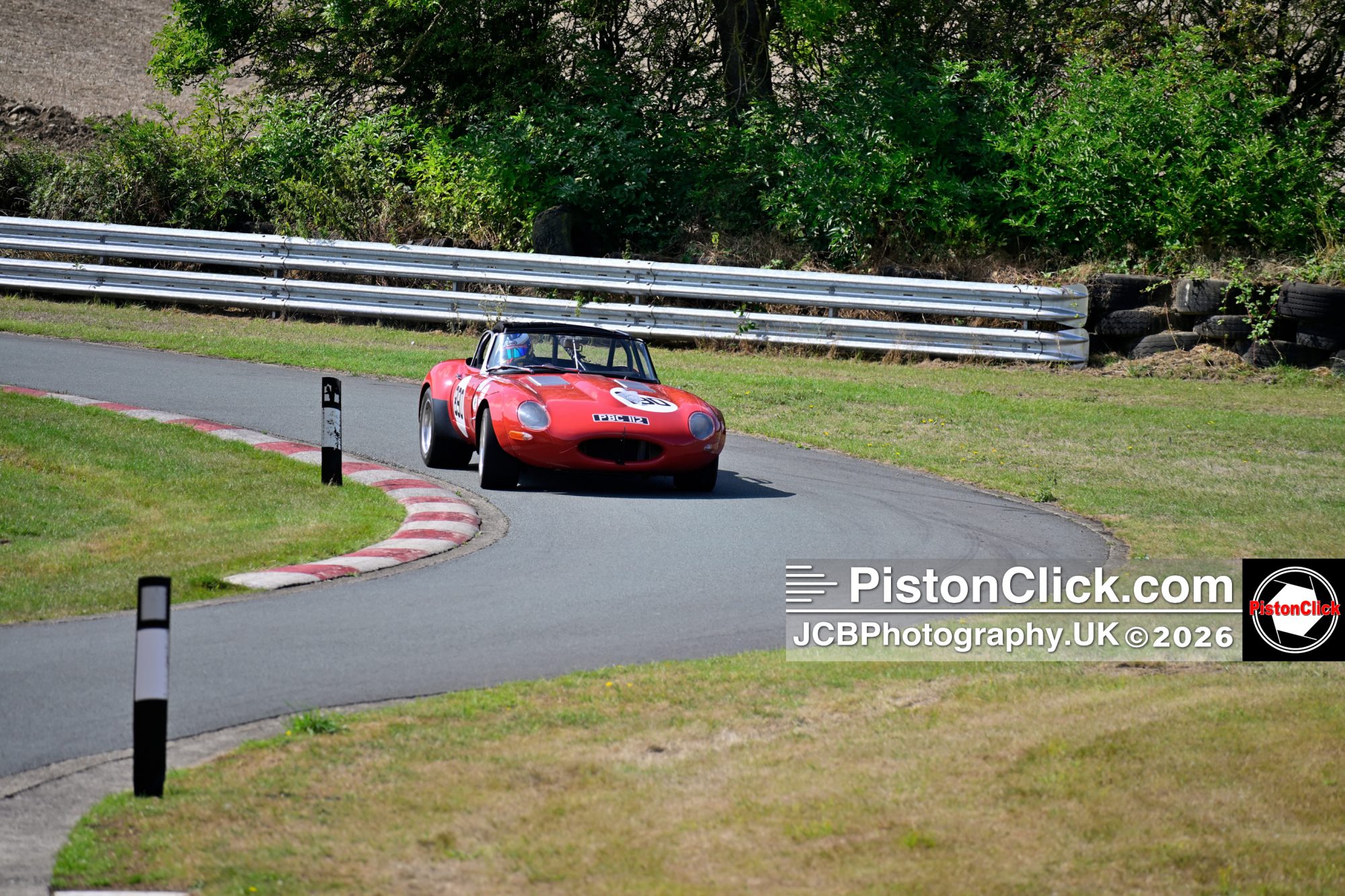 Rob Spedding in a Jaguar E-Type Harewood