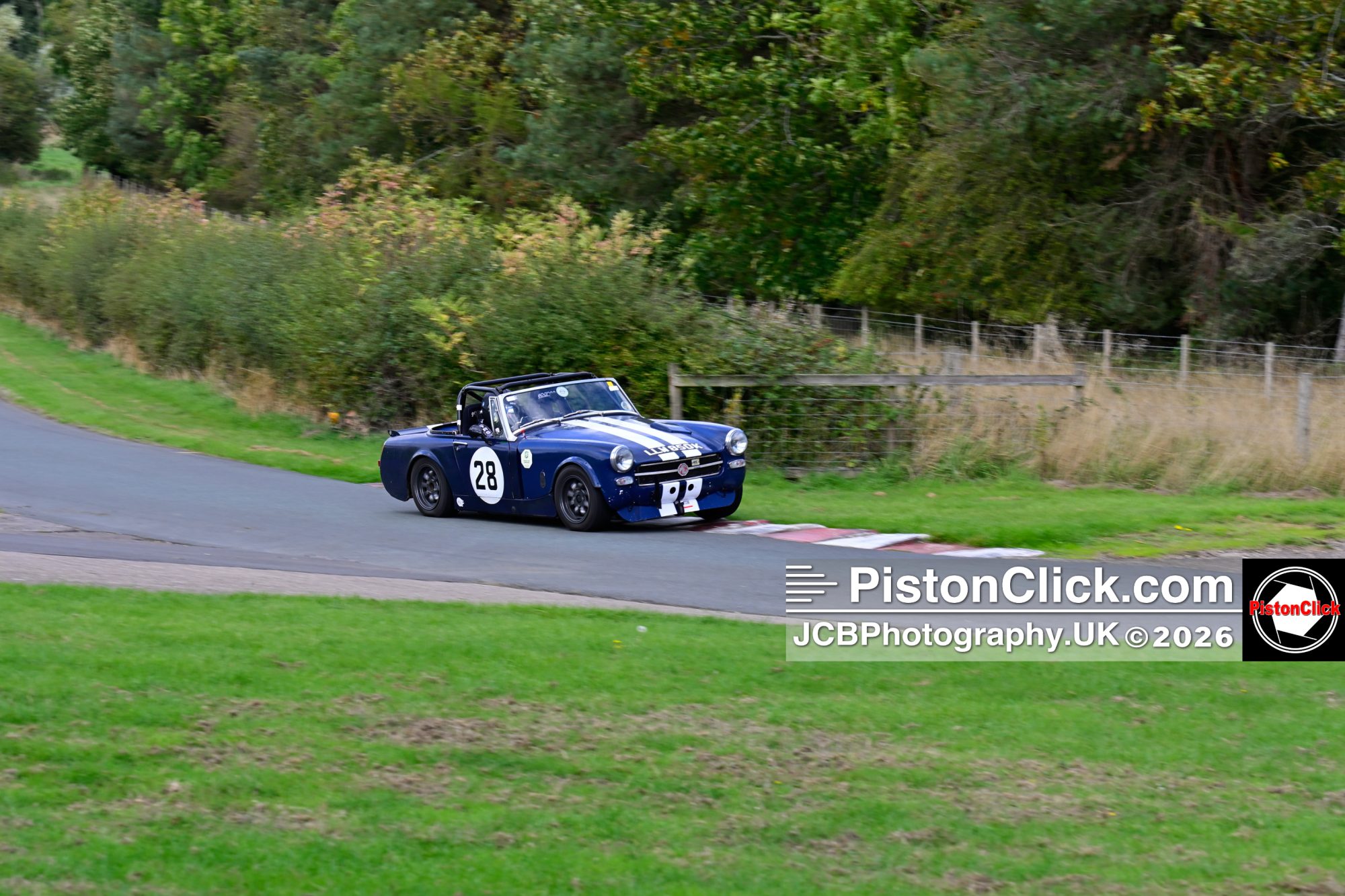 Rob Armstrong driving a MG Midget